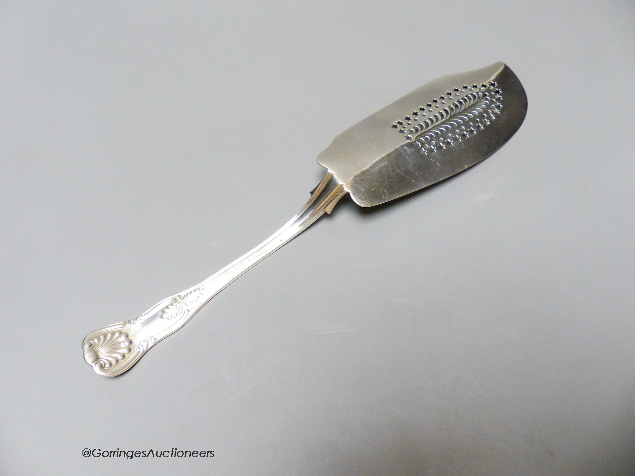 A William IV silver Kings pattern fish slice, London, 1830, 30.8cm, 154 grams, marks rubbed.